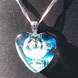 Beautiful wolf heart necklace on silver chain.
